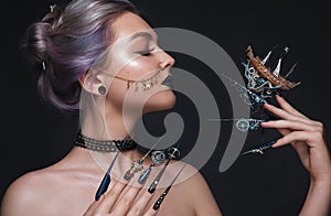 Beautiful girl with art make up in pirate style, creative long nails. Design manicure. Beauty face.