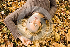 Beautiful girl in the Autumn fall