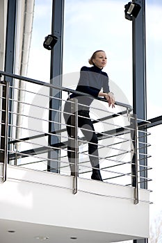 Beautiful girl on a balcony