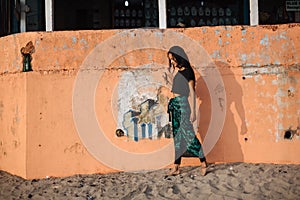 Beautiful girl in beach in Goa, India.