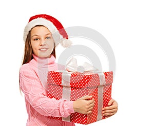 Beautiful girl with big red present for Christmas