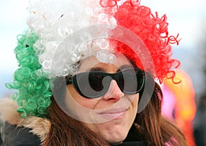 Beautiful girl with a big wig and sunglasses