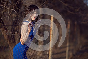 Beautiful girl in blue evening dress.