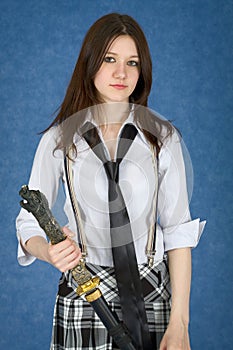 Beautiful girl on blue with japanese sword