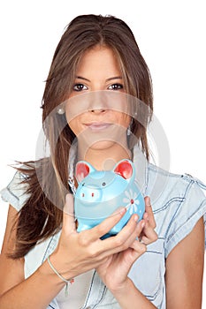 Beautiful girl with a blue piggy-bank