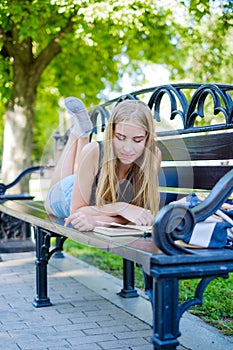 Beautiful girl with a book