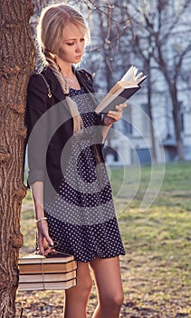 Beautiful girl with books