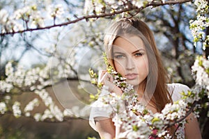 Beautiful girl in the branches