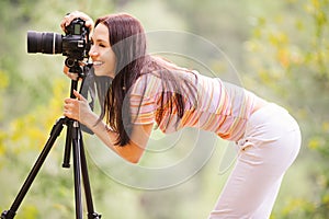 Beautiful girl with camera