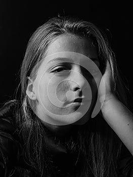 Beautiful girl closeup B&W low-key portrait