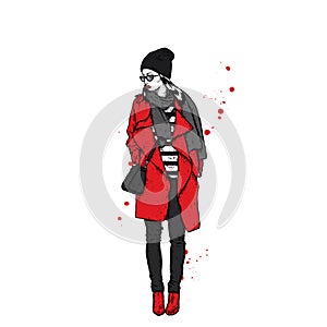 Beautiful girl in a coat with a cap and a scarf. Stylishly dressed woman. Vector fashion illustration.