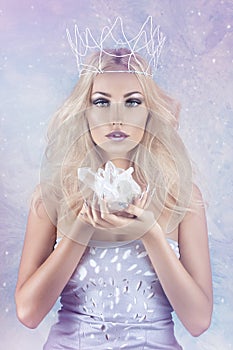 Beautiful girl crown holding crystal