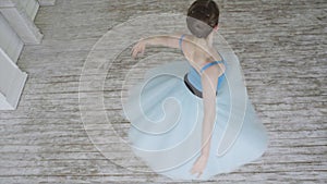 Beautiful Girl Dancer Performs Elements Of Classical Ballet In The Loft Design. Female Ballet Dancer Dancing. Close Up
