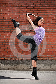 Beautiful girl dancing hip-hop