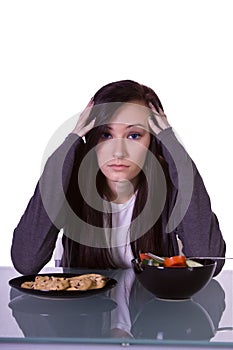 Beautiful Girl Deciding What to Eat