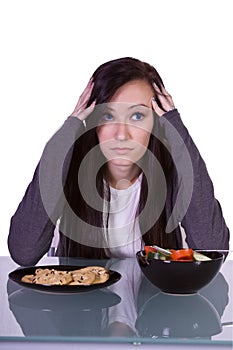 Beautiful Girl Deciding What to Eat