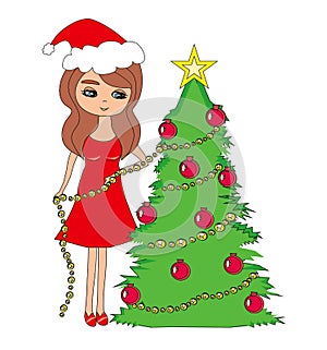 Beautiful girl decorates the Christmas tree