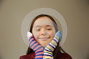 Beautiful girl with different socks