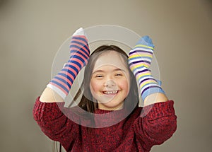 Beautiful girl with different socks