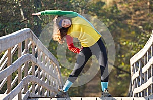 Beautiful girl doing stretching exercise