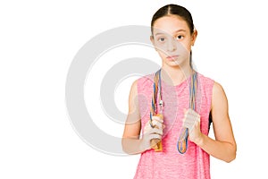 Beautiful girl doing using a jumping rope