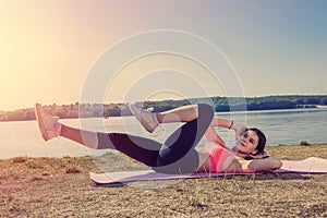 Beautiful  girl doing a yoga pose early morning before working time. Healhty lifestyle