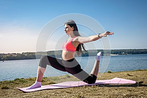 Beautiful  girl doing a yoga pose early morning before working time. Healhty lifestyle