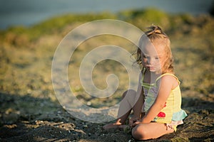 Beautiful girl with Down syndrome on the beach