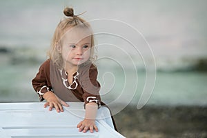 Beautiful girl with Down syndrome on the beach