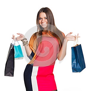 Beautiful girl in a dress shopping hands
