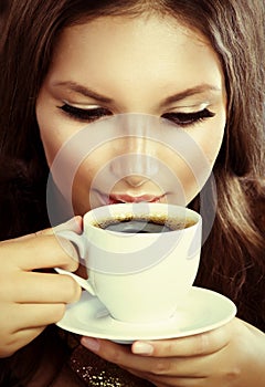 Beautiful Girl Drinking Coffee or Tea