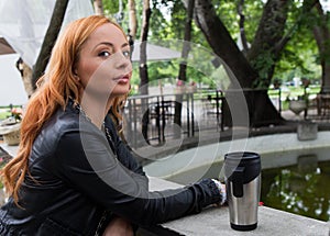 Beautiful Girl Drinking Tea or Coffee