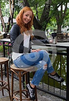 Beautiful Girl Drinking Tea or Coffee