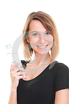 Beautiful girl drinking water from blue bottle isolated