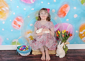 Beautiful girl at easter with her bunny