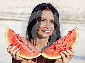 Beautiful girl eats water-melon