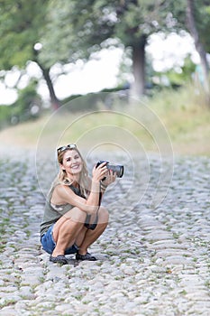 A beautiful girl embracing photography