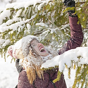 Beautiful Girl Enjoing the First Snow