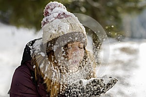 Beautiful Girl Enjoing the First Snow