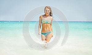 Beautiful girl exit the water in similan island