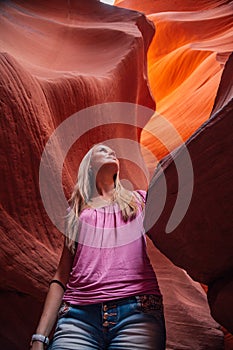 Beautiful girl exploring Lower Antilope Canyon