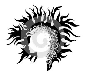 Beautiful girl face silhouette with curly hair surrounded by flames
