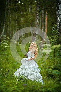 Beautiful girl in fairy forest
