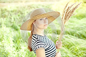 Beautiful girl in a field