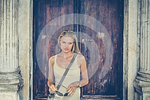 Beautiful Girl in Front of the Antient Cathedral Gate