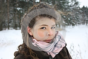 Beautiful girl in frost winter