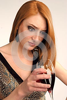 Beautiful girl frowns on alcohol