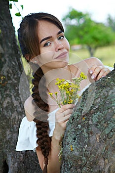 Beautiful girl in the garden