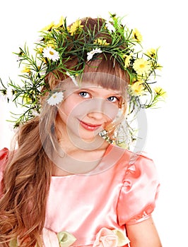 Beautiful girl with garland of spring flower.