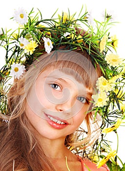 Beautiful girl with garland of wild flower.